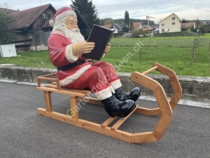 Weihnachtsmann Schlitten mit grossem Nikolaus mit Buch
